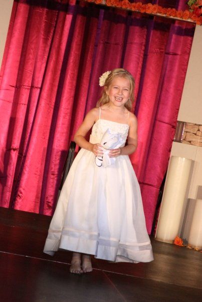 Elizabeth modeling as a flower girl at an Atlanta bridal show